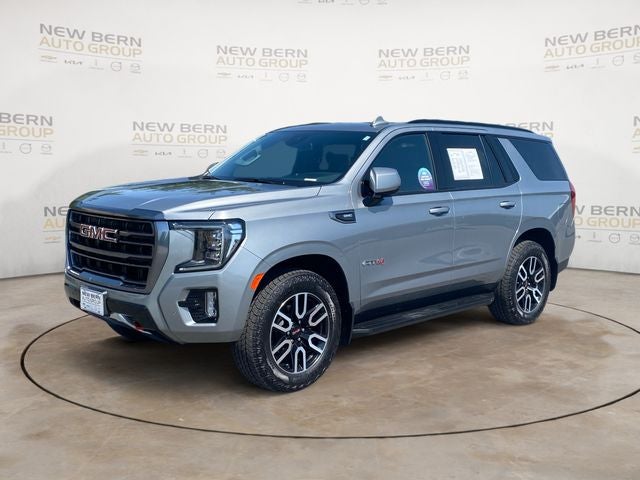 2024 GMC Yukon AT4 in Sterling Metallic — front three-quarter view