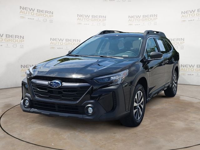 2023 Subaru Outback 2.5i in Crystal Black Silica — front three-quarter view
